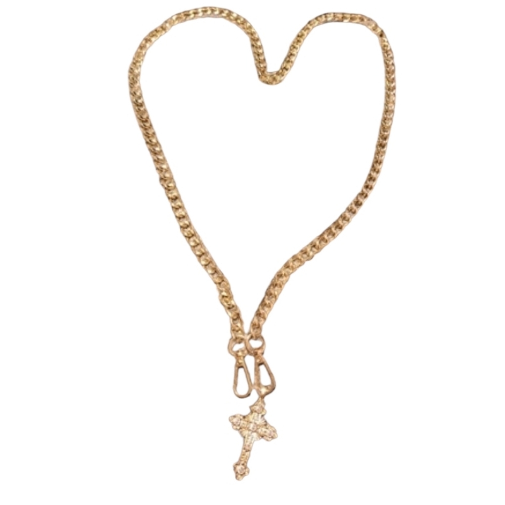 BELT WITH A GOLDEN CROSS AT END OF CHAIN.